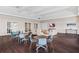 Community room with comfortable seating, tables, and a large TV at 16423 Bridle Ridge St, Port Charlotte, FL 33953