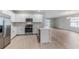 Modern kitchen with stainless steel appliances and island at 16423 Bridle Ridge St, Port Charlotte, FL 33953
