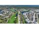Aerial view of community near golf course and RV park at 3332 Grand Vista Ct # 101, Port Charlotte, FL 33953