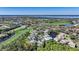 Aerial view of community near golf course and water at 3332 Grand Vista Ct # 101, Port Charlotte, FL 33953