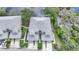 Aerial perspective showcasing the community's location near a lake at 3332 Grand Vista Ct # 101, Port Charlotte, FL 33953