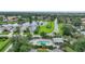 Community pool and surrounding homes with lush landscaping at 3332 Grand Vista Ct # 101, Port Charlotte, FL 33953