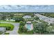 Community pool and homes with lush landscaping at 3332 Grand Vista Ct # 101, Port Charlotte, FL 33953