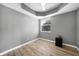 Simple bedroom with light gray walls and wood flooring at 3332 Grand Vista Ct # 101, Port Charlotte, FL 33953