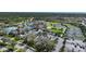 Community clubhouse with pool, tennis courts, and ample parking at 3332 Grand Vista Ct # 101, Port Charlotte, FL 33953