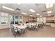 Community room with tables and chairs at 3332 Grand Vista Ct # 101, Port Charlotte, FL 33953