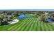 Golf course with ponds and lush green fairways at 3332 Grand Vista Ct # 101, Port Charlotte, FL 33953