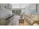 Living area featuring a view and neutral decor at 3332 Grand Vista Ct # 101, Port Charlotte, FL 33953