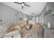 Spacious living room with a view of the lake at 3332 Grand Vista Ct # 101, Port Charlotte, FL 33953