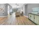 Living room with hardwood floors and lake view at 3332 Grand Vista Ct # 101, Port Charlotte, FL 33953