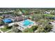 Aerial view of community pool and clubhouse at 3332 Grand Vista Ct # 101, Port Charlotte, FL 33953