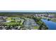 Community tennis courts near clubhouse and pond at 3332 Grand Vista Ct # 101, Port Charlotte, FL 33953