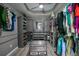 Large walk-in closet with ample shelving and hanging space at 3332 Grand Vista Ct # 101, Port Charlotte, FL 33953
