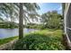 Peaceful waterfront view of the property at 3332 Grand Vista Ct # 101, Port Charlotte, FL 33953