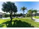 Private dock with lush landscaping and a view of the canal at 18598 Briggs Cir, Port Charlotte, FL 33948