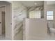 Modern bathroom featuring marble tile shower and marble countertop at 9310 Rosebud Cir, Port Charlotte, FL 33981
