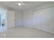 Bright bedroom with white marble floors and a ceiling fan at 9310 Rosebud Cir, Port Charlotte, FL 33981