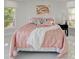 Cozy bedroom with a comfortable bed and natural light from windows at 9310 Rosebud Cir, Port Charlotte, FL 33981