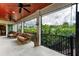 Screened-in balcony with ceiling fans and beautiful views at 611 W Olympia Ave, Punta Gorda, FL 33950