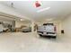 Spacious garage includes parking for multiple vehicles and ample storage at 611 W Olympia Ave, Punta Gorda, FL 33950