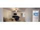 Bright living room with tile floors and comfy armchairs at 3100 Harbor Blvd # 116, Port Charlotte, FL 33952