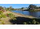 Peaceful canal view with lush green landscape at 3100 Harbor Blvd # 116, Port Charlotte, FL 33952