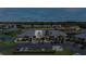 Aerial view showing condo building and surrounding landscape at 3256 White Ibis Ct # 13B, Punta Gorda, FL 33950