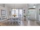 Formal dining room with white table and chairs at 2556 Saturday St, North Port, FL 34288