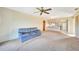 Living room with open kitchen and access to hallway and bathroom at 4260 Placida Rd # 15D, Englewood, FL 34224