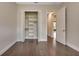 Spacious bedroom closet with built-in shelving and hardwood floors at 5451 Prime Ter, North Port, FL 34286