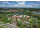 Aerial view of community amenities, including pool and tennis at 1289 Ballota Ln, North Port, FL 34289