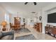 Open dining room with dark wood furniture and view to kitchen at 1289 Ballota Ln, North Port, FL 34289