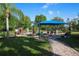 Enjoy a relaxing game of shuffleboard under the shade at 1289 Ballota Ln, North Port, FL 34289