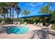 Community spa with lounge chairs under a shaded area at 1289 Ballota Ln, North Port, FL 34289