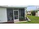 Screened porch with wicker furniture, perfect for relaxing at 22580 Bolanos Ct, Port Charlotte, FL 33952