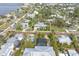 Aerial close-up view of a luxury home in a tropical neighborhood at 116 Dolly St, Punta Gorda, FL 33950