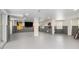 Finished basement featuring gray flooring and pop art decor at 116 Dolly St, Punta Gorda, FL 33950