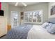 Main bedroom with private balcony access and plenty of natural light at 116 Dolly St, Punta Gorda, FL 33950