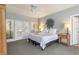 Main bedroom with king-size bed and access to private deck at 116 Dolly St, Punta Gorda, FL 33950