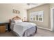 Cozy bedroom with window shutters and a view of the outdoors at 116 Dolly St, Punta Gorda, FL 33950
