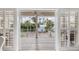 Private deck with view of tropical landscape and neighboring homes at 116 Dolly St, Punta Gorda, FL 33950