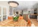 Charming dining room with rustic wood table and white shutters at 116 Dolly St, Punta Gorda, FL 33950