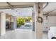 Garage with epoxy flooring, electric car charger and storage at 116 Dolly St, Punta Gorda, FL 33950