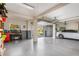 Garage with epoxy flooring, workbench, and room for two cars at 116 Dolly St, Punta Gorda, FL 33950