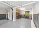 Garage with epoxy flooring, storage shelving and room for bikes at 116 Dolly St, Punta Gorda, FL 33950