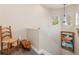 Upstairs landing with unique decor and a view to the floor below at 116 Dolly St, Punta Gorda, FL 33950