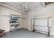 Organized pool equipment storage with shelving and a folding table at 116 Dolly St, Punta Gorda, FL 33950