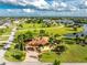 Bird's-eye view of home showcasing its expansive backyard and location at 24087 Santa Inez Rd, Punta Gorda, FL 33955