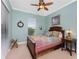 Cozy bedroom with a queen-size bed and calming decor at 24087 Santa Inez Rd, Punta Gorda, FL 33955