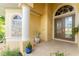 Elegant entryway with double doors and arched window at 24087 Santa Inez Rd, Punta Gorda, FL 33955